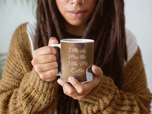 funny coffee  mug 11oz left side "I like my men like I like my coffee" being held by person